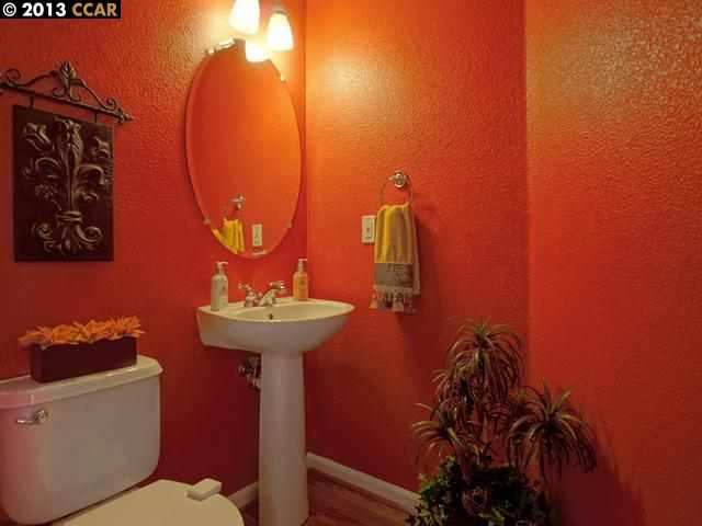 Terraced Hills Way San Ramon, CA 94583 - Photo 13 of 15 a bathroom with a toilet sink and mirror
