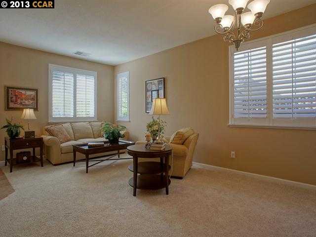 Terraced Hills Way San Ramon, CA 94583 - Photo 2 of 15 a living room with furniture and a chandelier