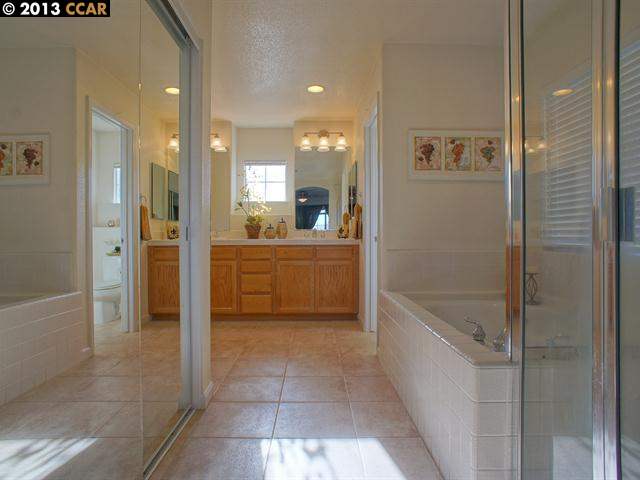 Terraced Hills Way San Ramon, CA 94583 - Photo 8 of 15 a bathroom with a bathtub and a sink