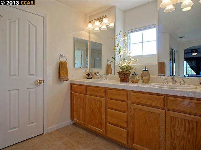Terraced Hills Way San Ramon, CA 94583 - Photo 9 of 15 a bathroom with a double vanity sink and a mirror