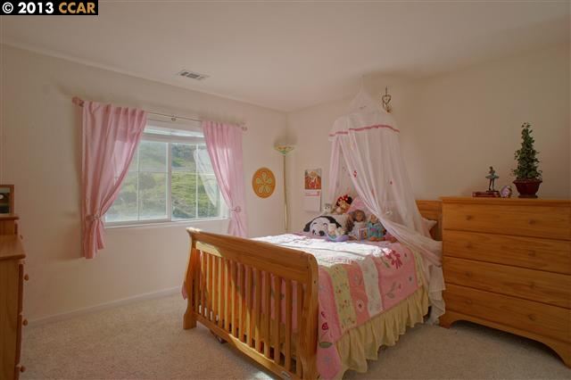 Terraced Hills Way San Ramon, CA 94583 - Photo 10 of 15 a bed room with a bed and a window