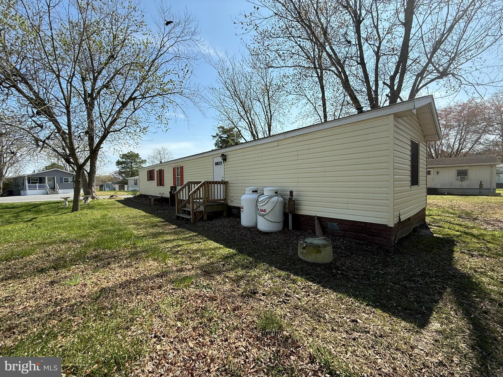 2908 Ram Road Cambridge, MD 21613 - Photo 6 of 27 a view of a back yard of the house