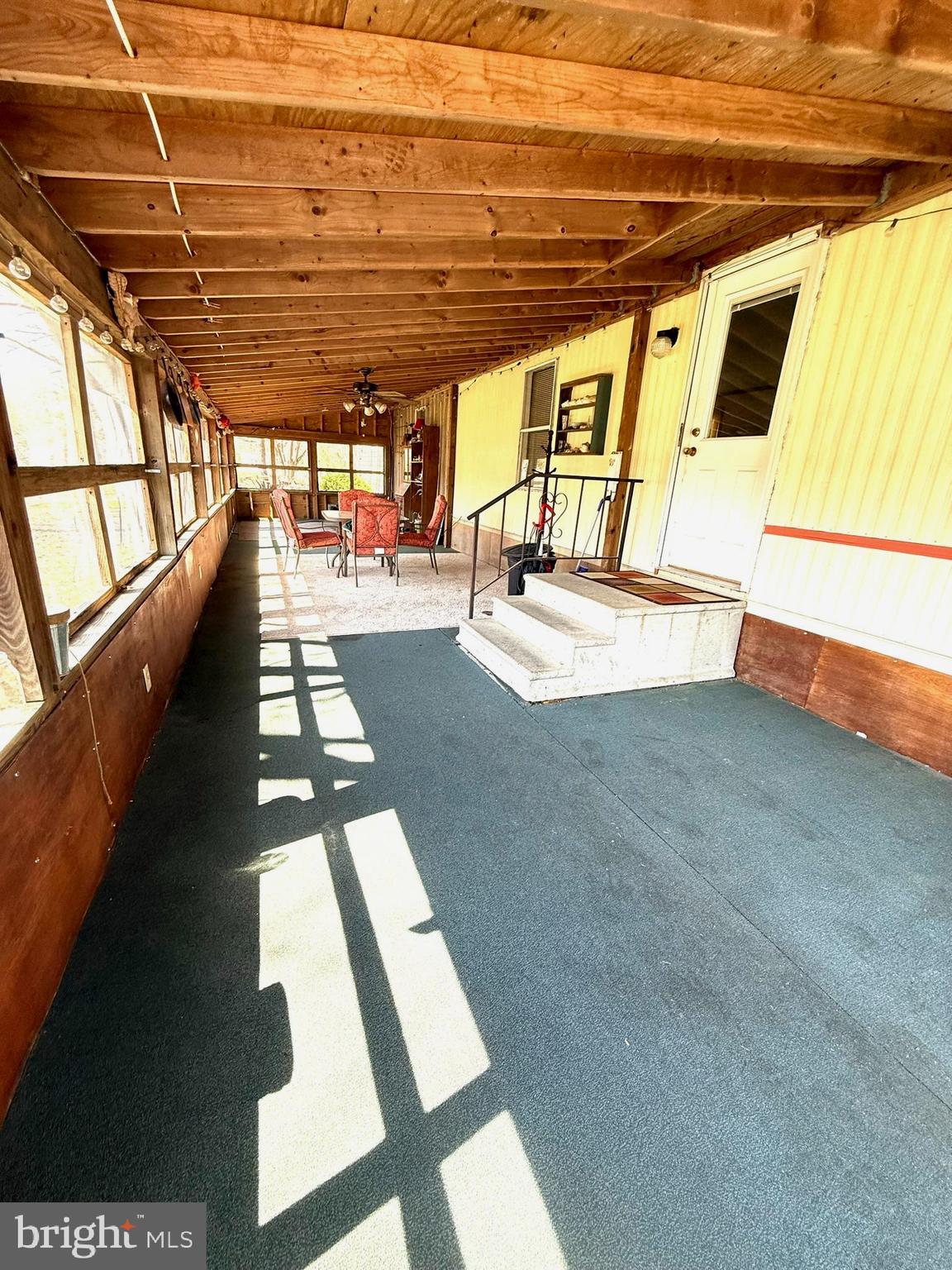 2908 Ram Road Cambridge, MD 21613 - Photo 9 of 27 a view of an empty room with windows