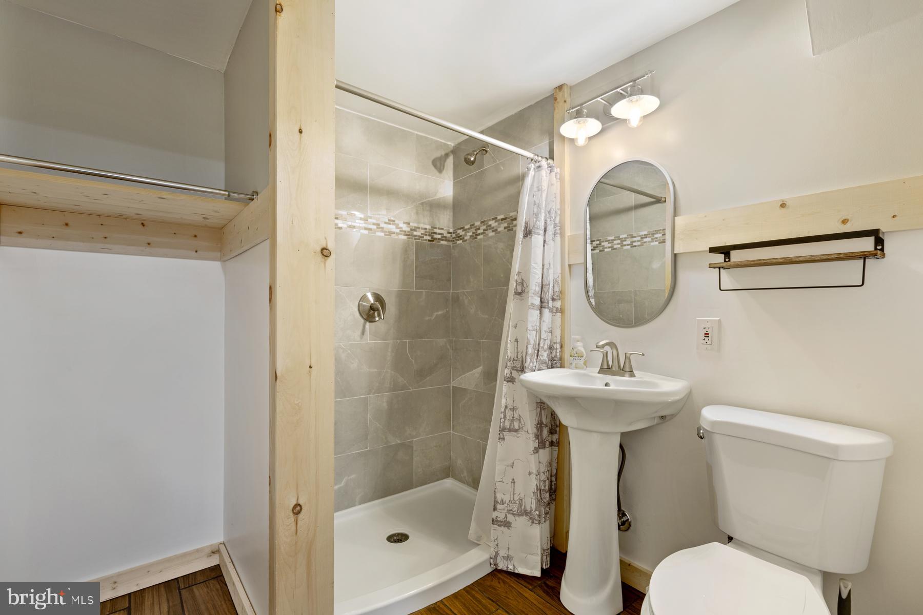 7804 Rippleview Lane Pasadena, MD 21122 - Photo 23 of 29 Basement Full Bath