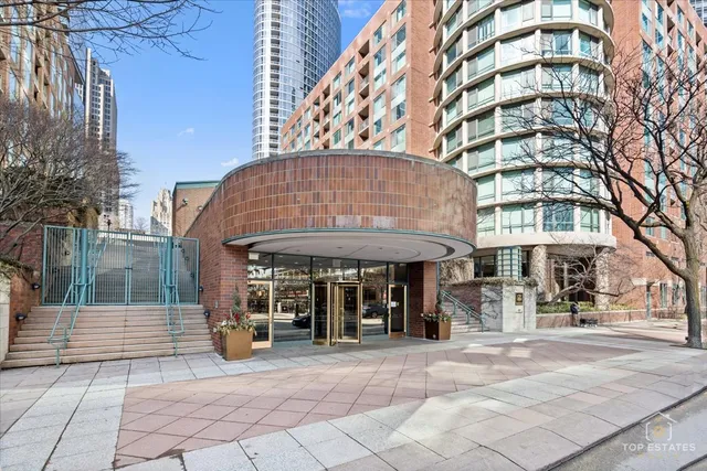 a view of a building with sitting area