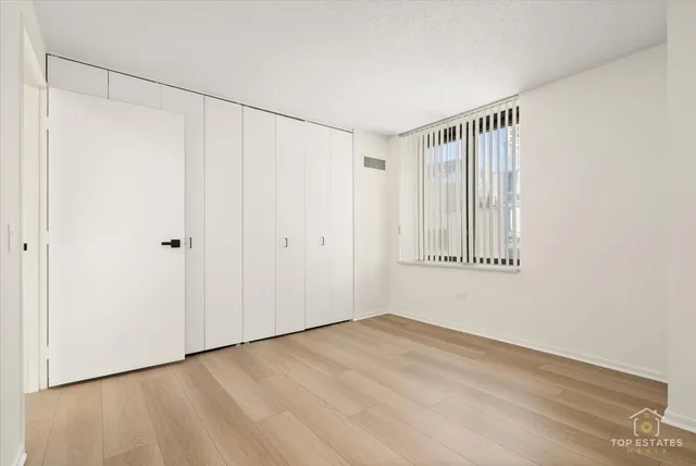 a bathroom with a sink a toilet and vanity