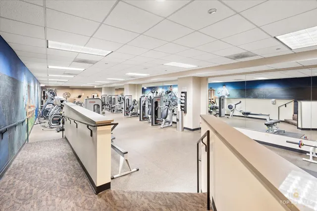 a bathroom with a sink a toilet and a shower