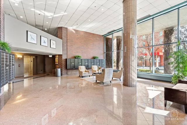 a view of a building with sitting area