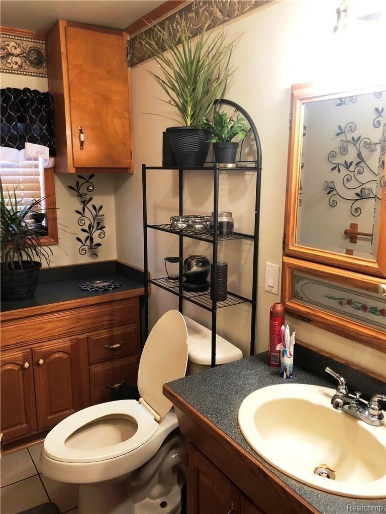 1696 South Phillips Road Deford, MI 48729 - Photo 15 of 18 Phillips Bathroom.jpg
