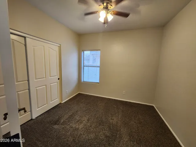 a view of a bathroom from a hallway