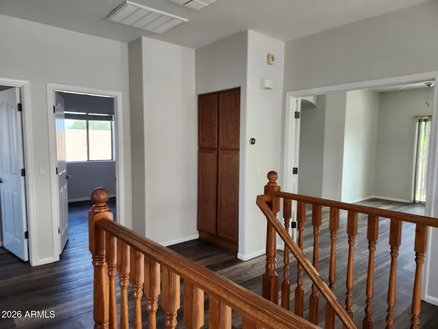 a view of entryway with wooden floor