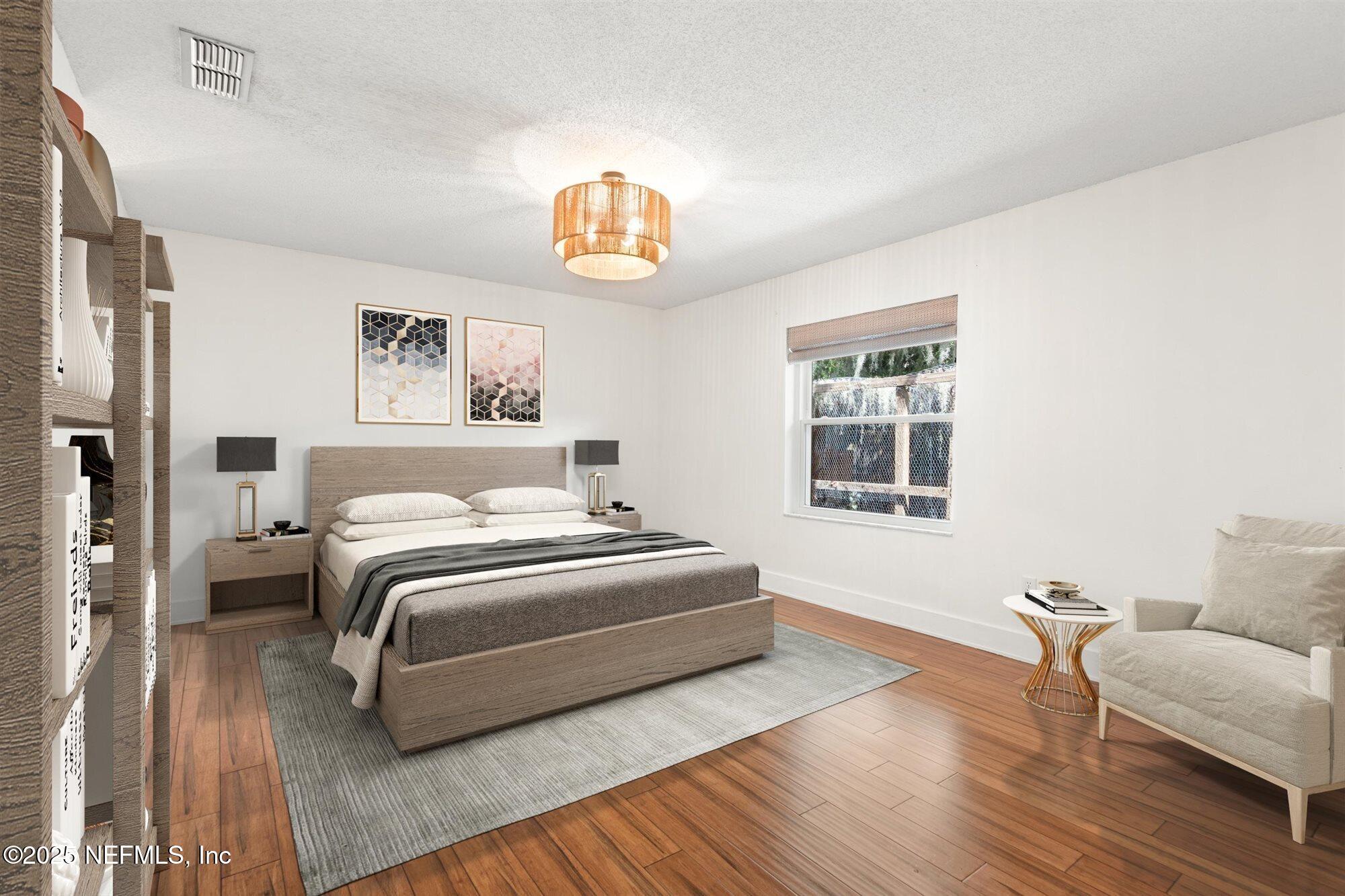 113 Mohegan Road St. Augustine, FL 32086 - Photo 19 of 56 a bedroom with a bed and a couch