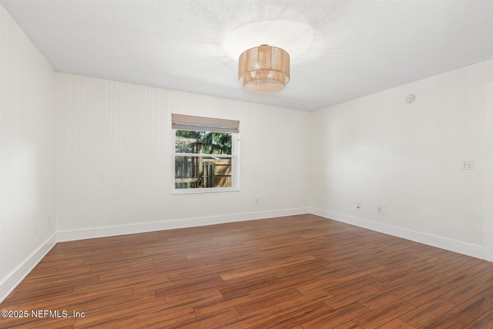 113 Mohegan Road St. Augustine, FL 32086 - Photo 21 of 56 wooden floor in an empty room