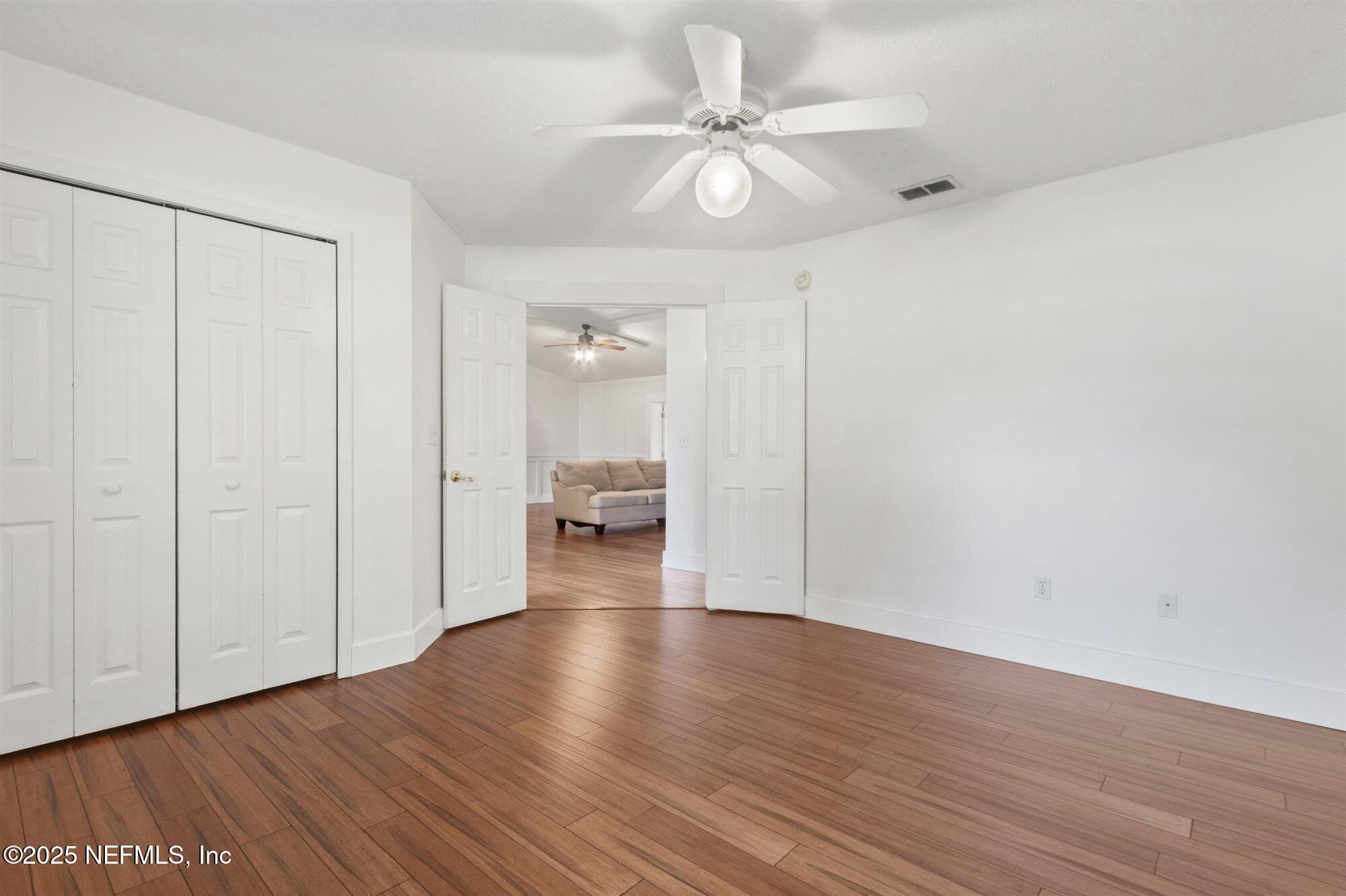 113 Mohegan Road St. Augustine, FL 32086 - Photo 32 of 56 a view of a livingroom with wooden floor
