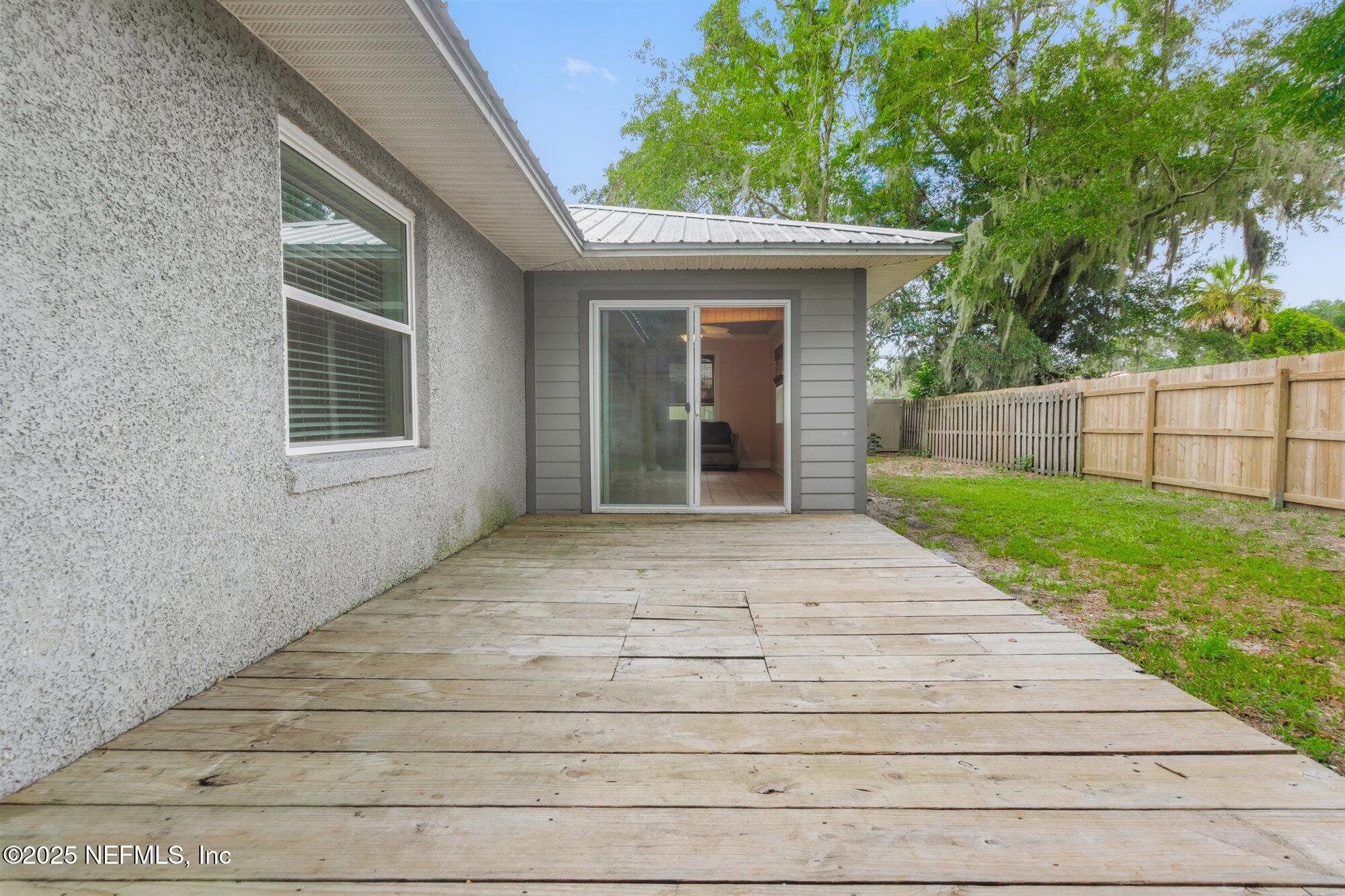 113 Mohegan Road St. Augustine, FL 32086 - Photo 35 of 56 a view of house with backyard and garden
