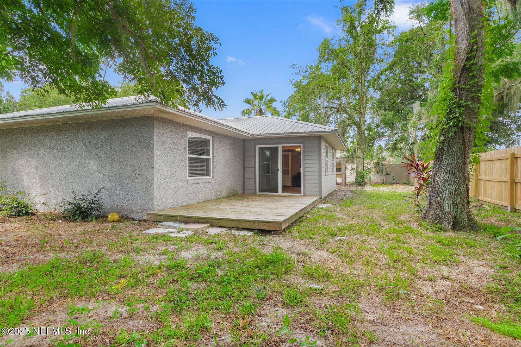 113 Mohegan Road St. Augustine, FL 32086 - Photo 36 of 56 a view of a house with a yard