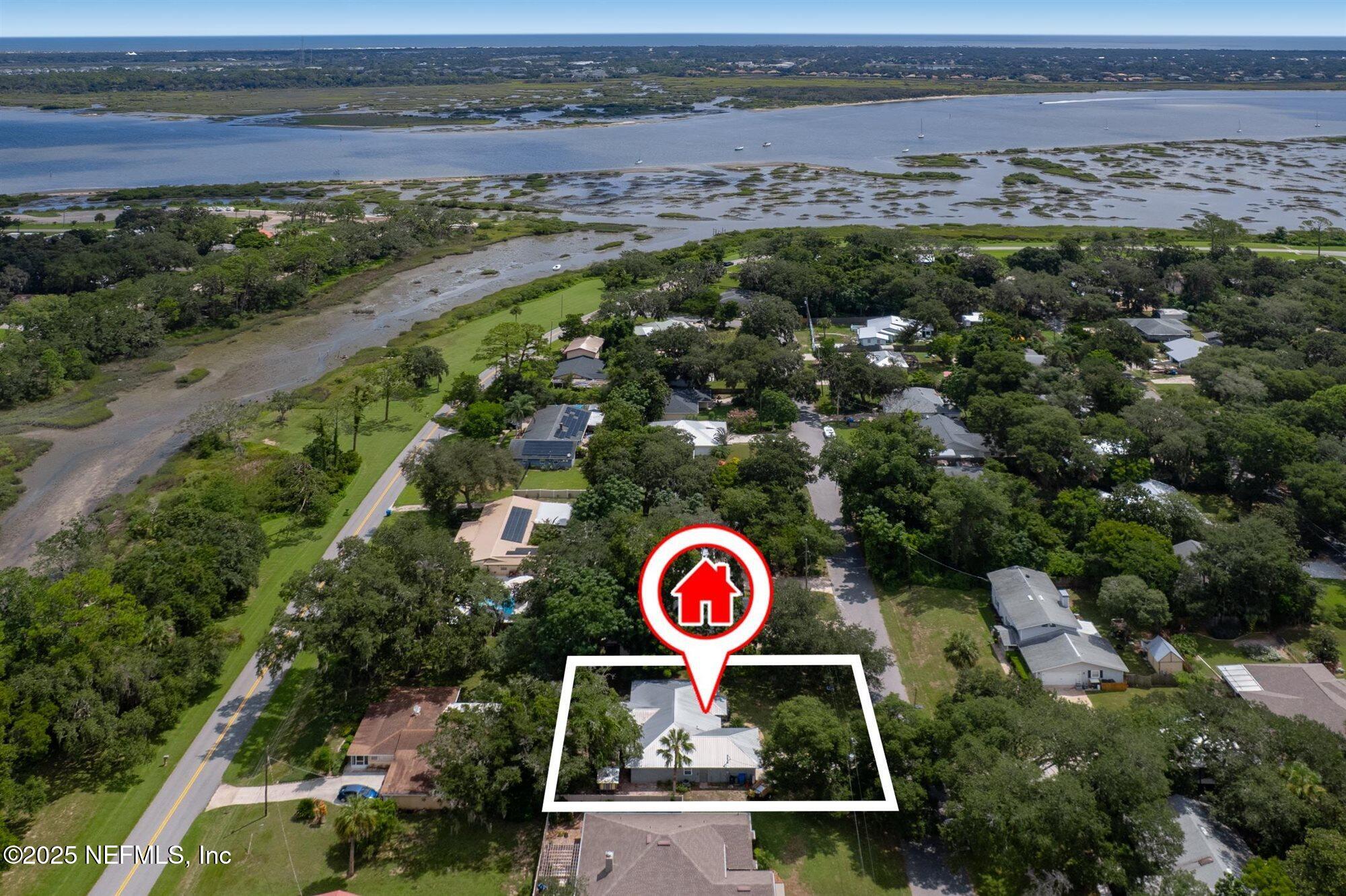113 Mohegan Road St. Augustine, FL 32086 - Photo 40 of 56 an aerial view of sign board with lake view