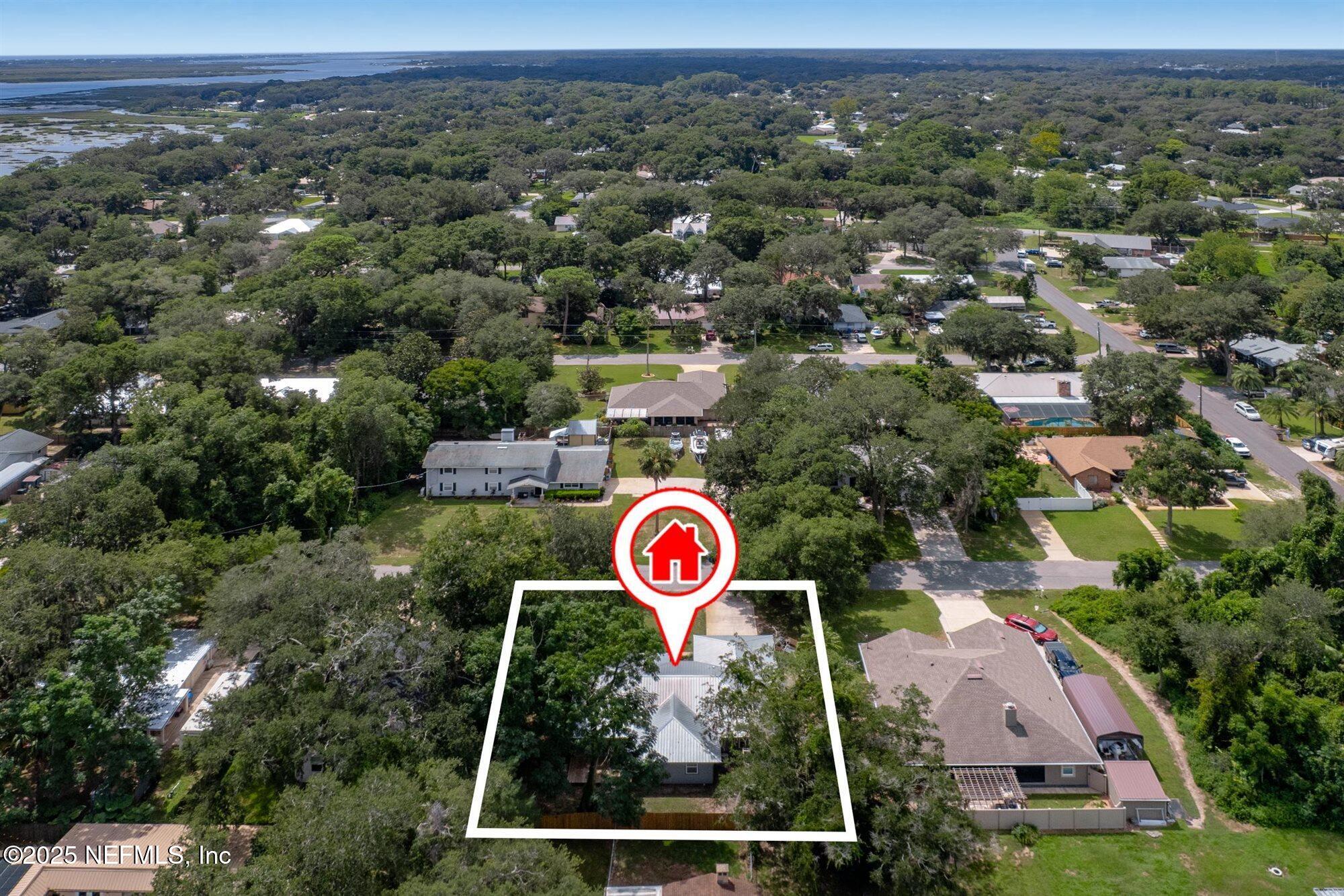 113 Mohegan Road St. Augustine, FL 32086 - Photo 41 of 56 an aerial view of residential houses with outdoor space and swimming pool