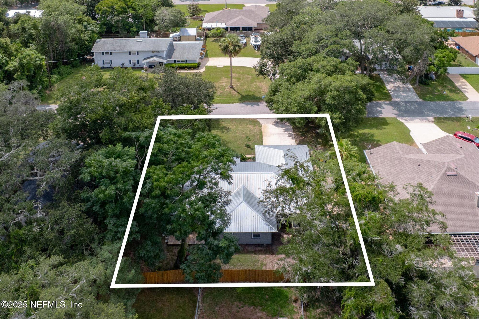 113 Mohegan Road St. Augustine, FL 32086 - Photo 42 of 56 an aerial view of house with a yard