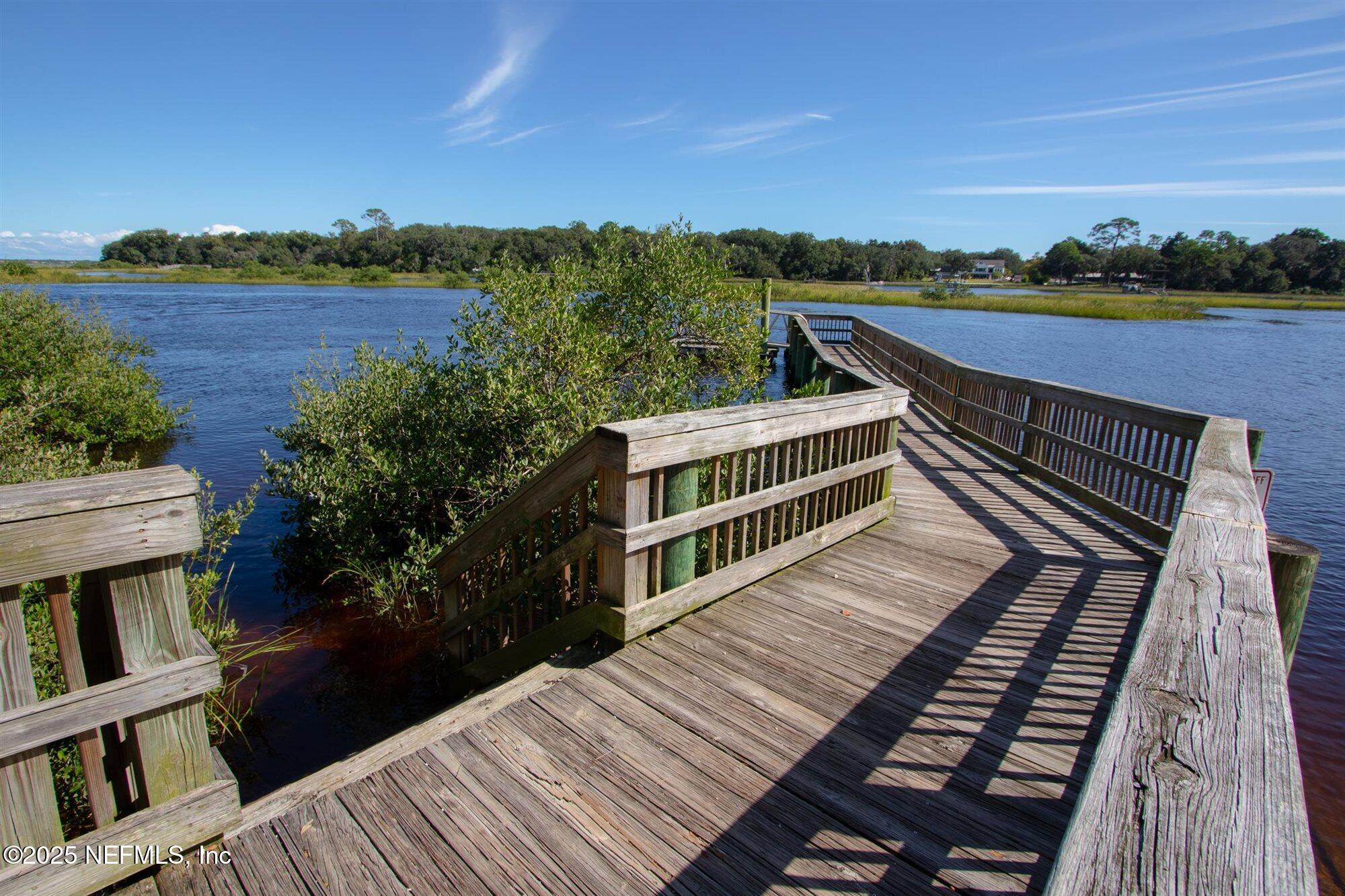 113 Mohegan Road St. Augustine, FL 32086 - Photo 45 of 56 a view of balcony with wooden floor and lake view