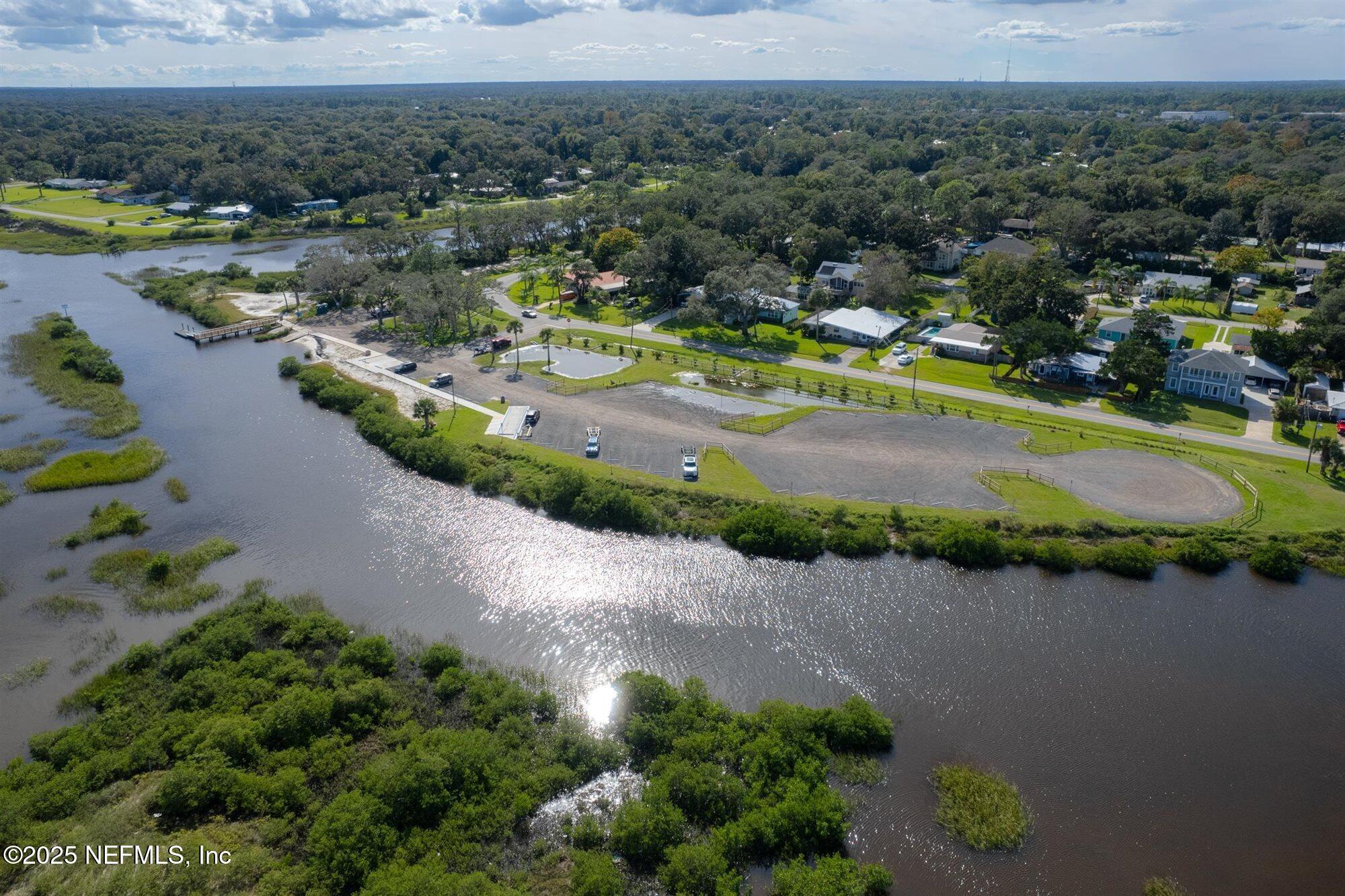 113 Mohegan Road St. Augustine, FL 32086 - Photo 46 of 56 an aerial view of a houses with outdoor space and lake view