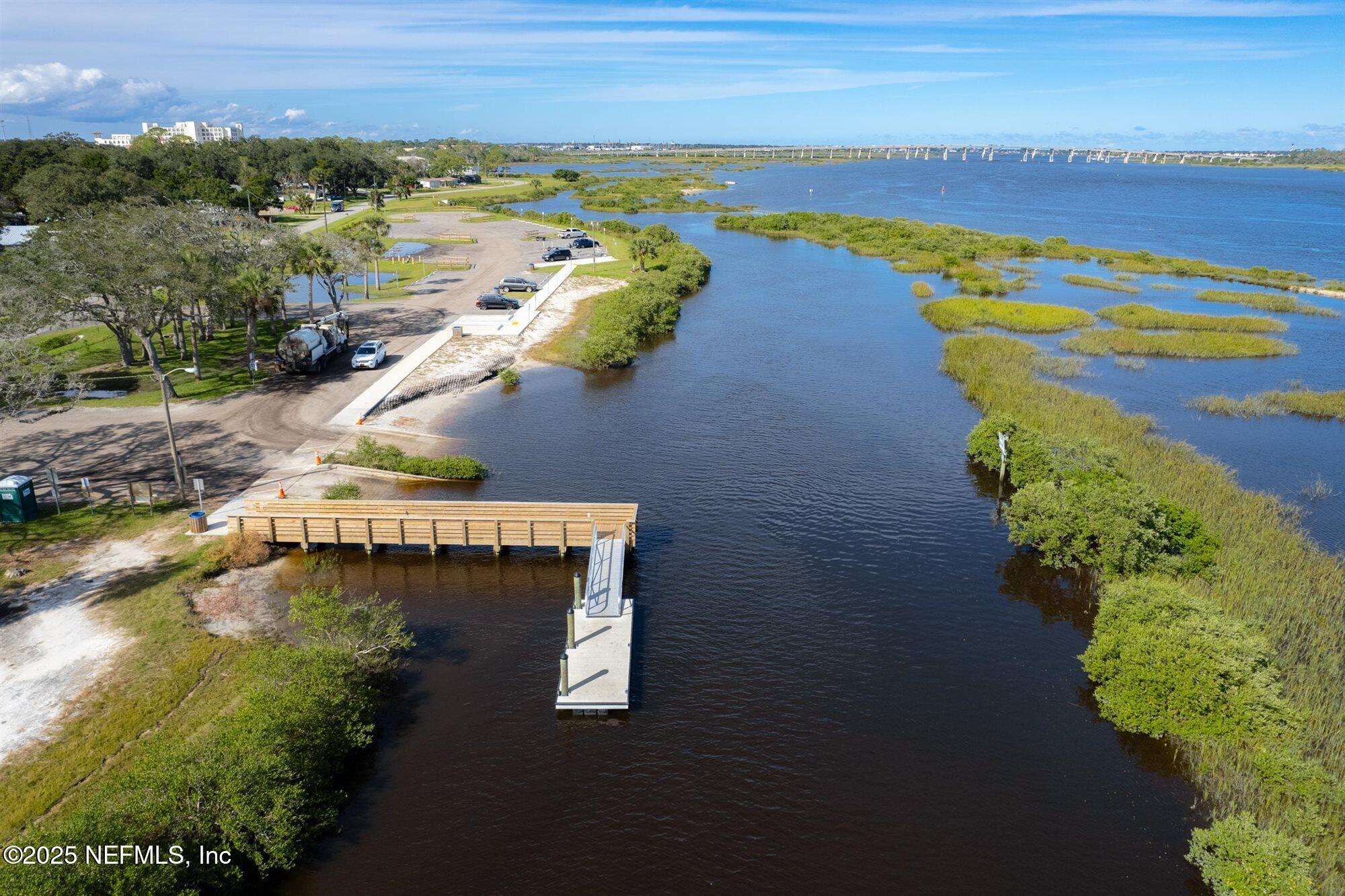 113 Mohegan Road St. Augustine, FL 32086 - Photo 48 of 56 a view of a lake with a mountain