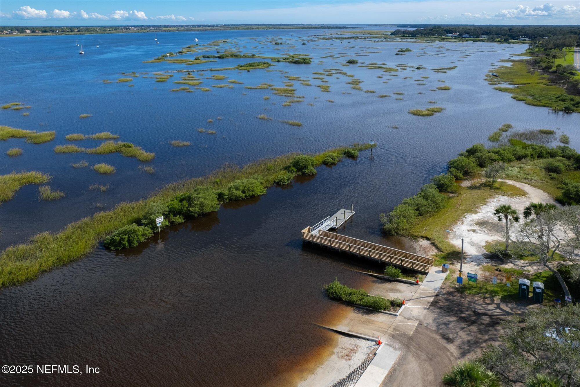 113 Mohegan Road St. Augustine, FL 32086 - Photo 49 of 56 an aerial view of a house with a lake view