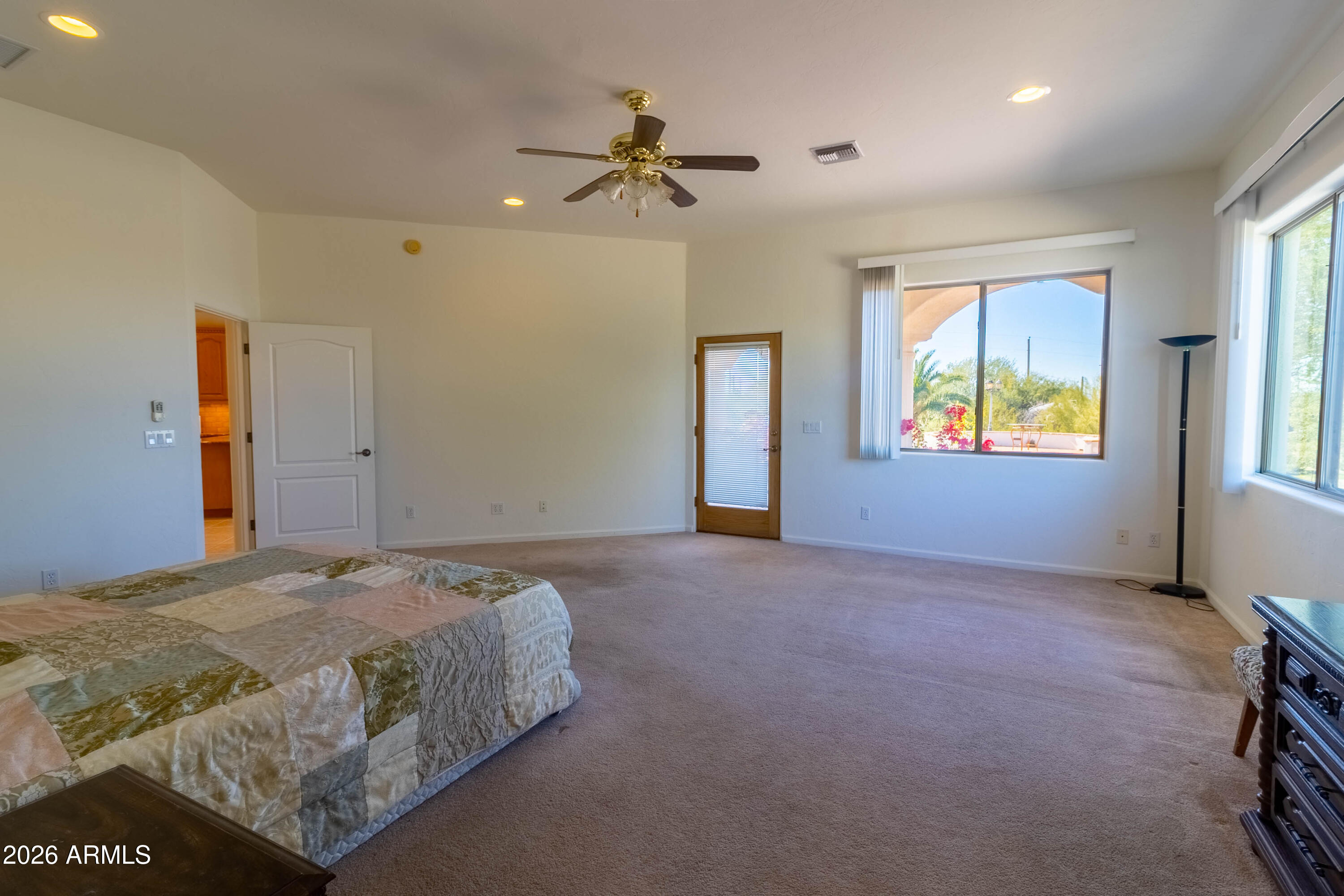 5159 North Lak A Yucca Road Tucson, AZ 85743 - Photo 28 of 66 a bedroom with a bed and a window