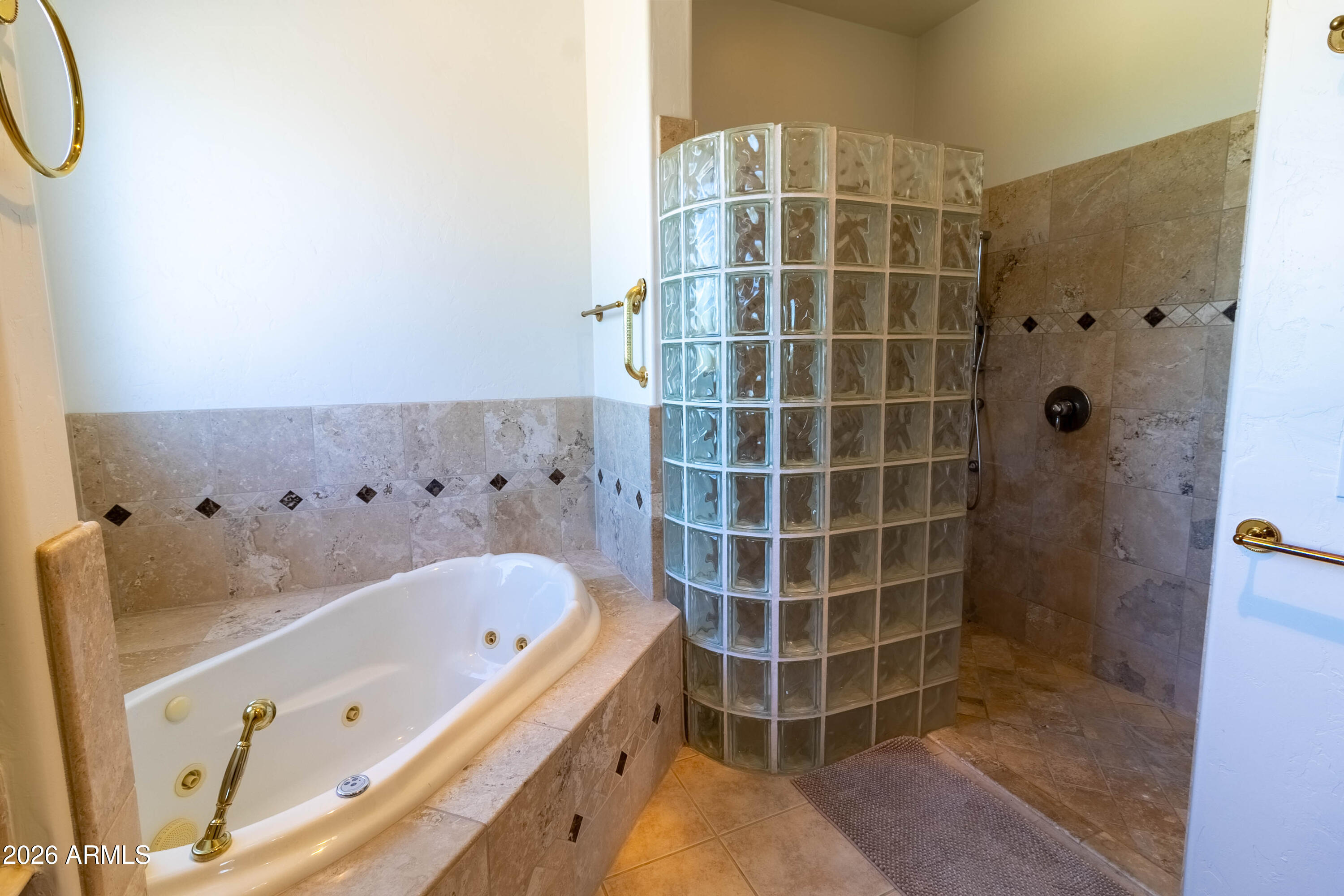 5159 North Lak A Yucca Road Tucson, AZ 85743 - Photo 31 of 66 a bathroom with a bathtub and shower