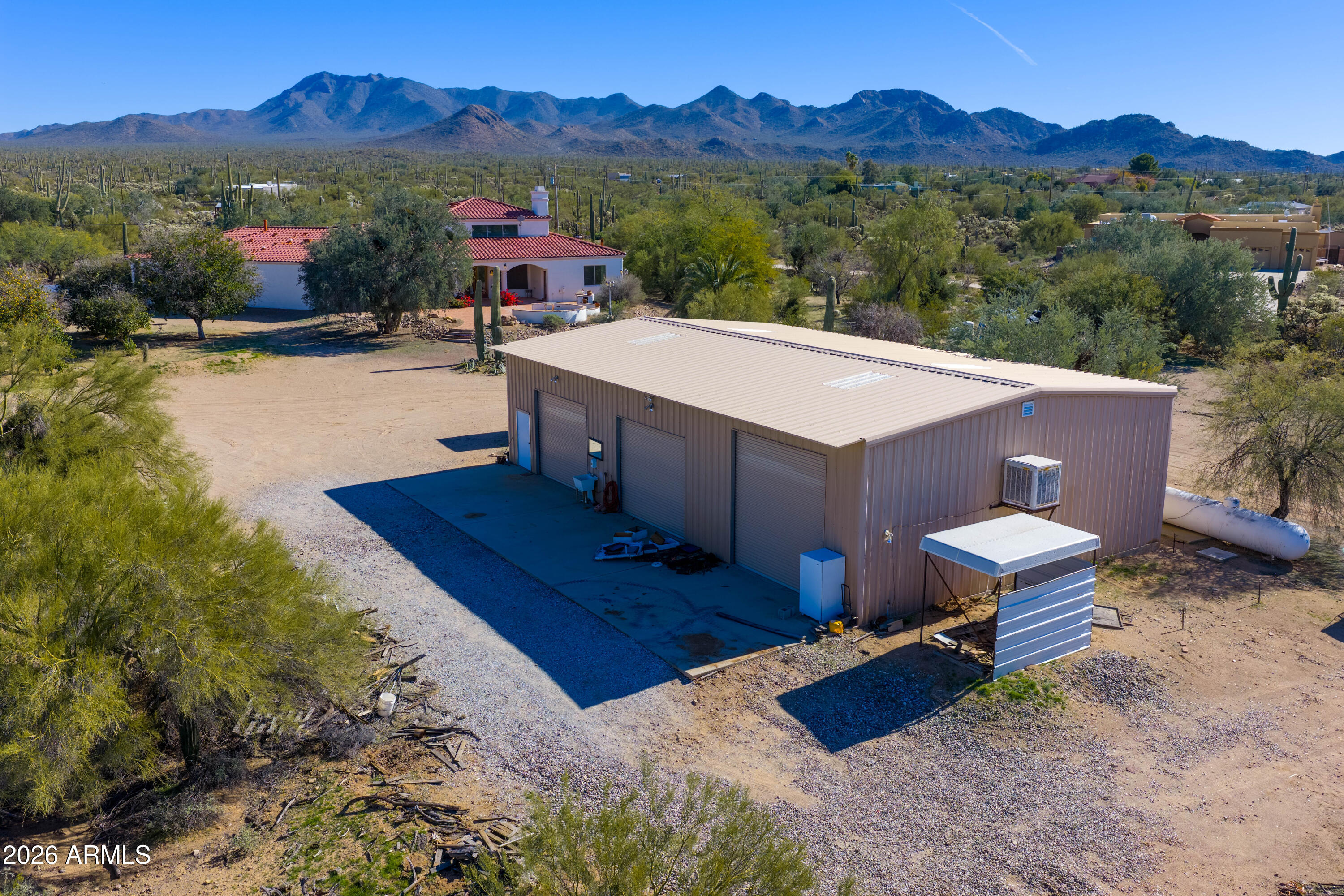 5159 North Lak A Yucca Road Tucson, AZ 85743 - Photo 44 of 66 a view of a terrace with a table and chairs