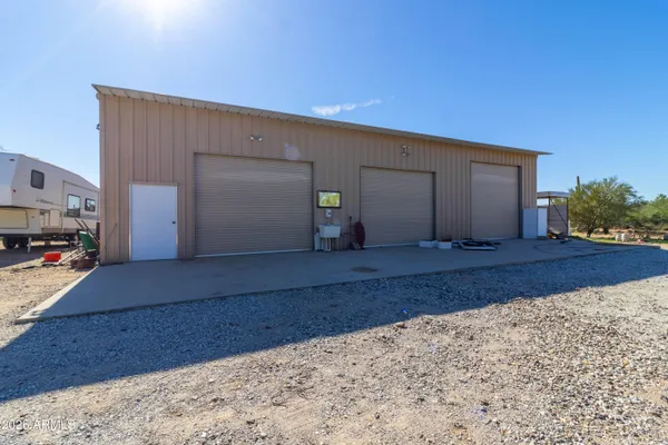 an aerial view of residential house and trees