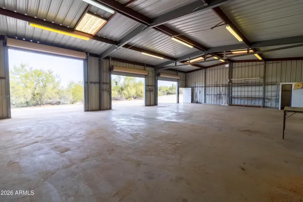 a view of a town with mountains in the background