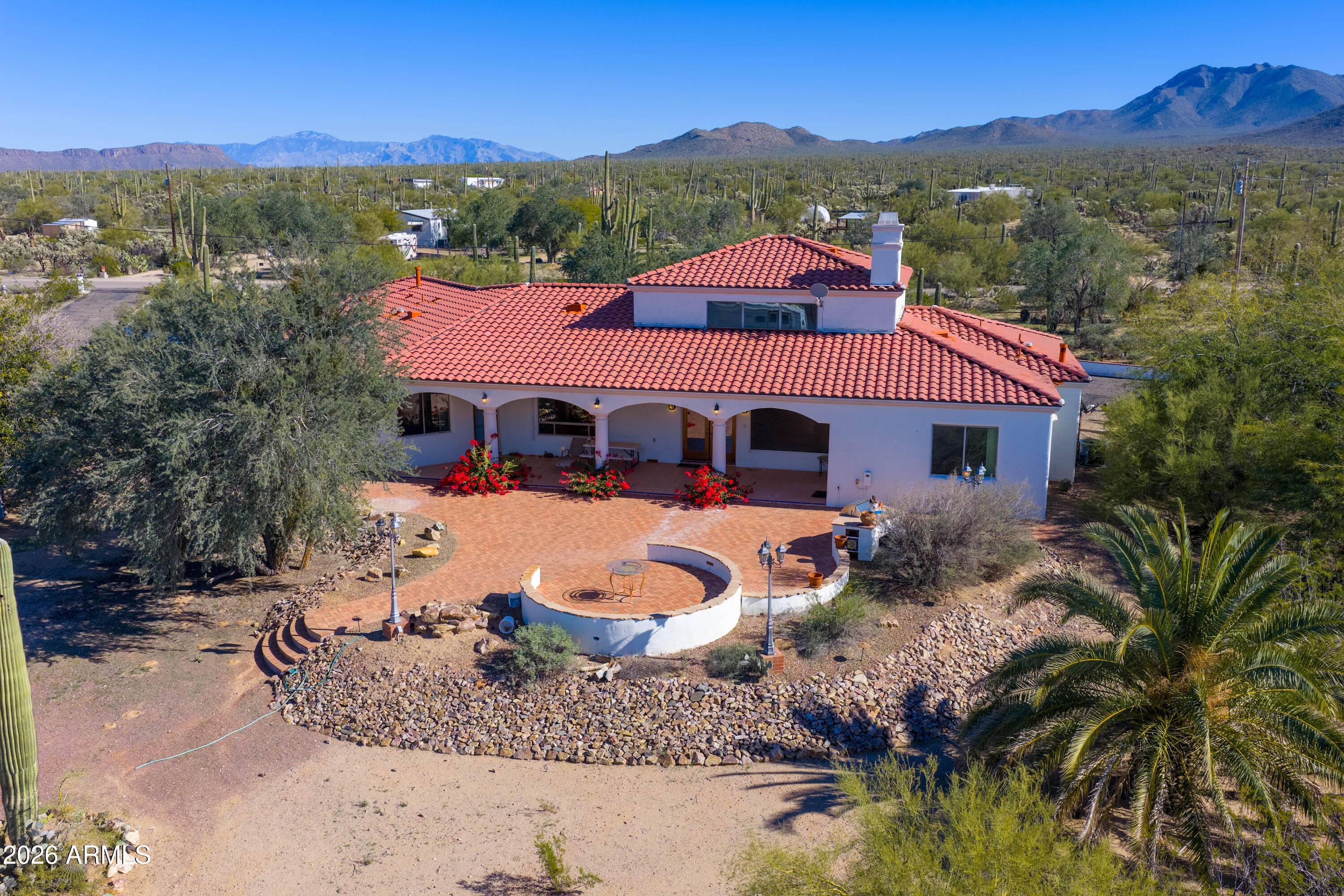 5159 North Lak A Yucca Road Tucson, AZ 85743 - Photo 49 of 66 a front view of a house with a yard and mountain