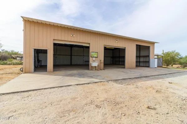 an aerial view of a house with outdoor space