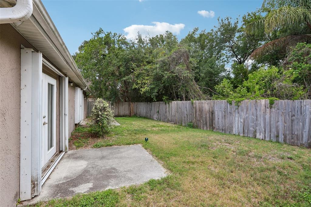 1525 Kestrel Way Brandon, FL 33511 - Photo 46 of 48 a view of backyard with green space