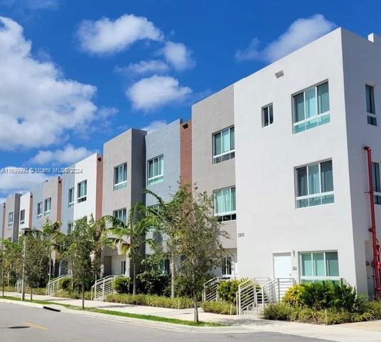2561 Northeast 193rd Street, Unit 1207 Miami, FL 33180 - Photo 21 of 21 a front view of a multi story building