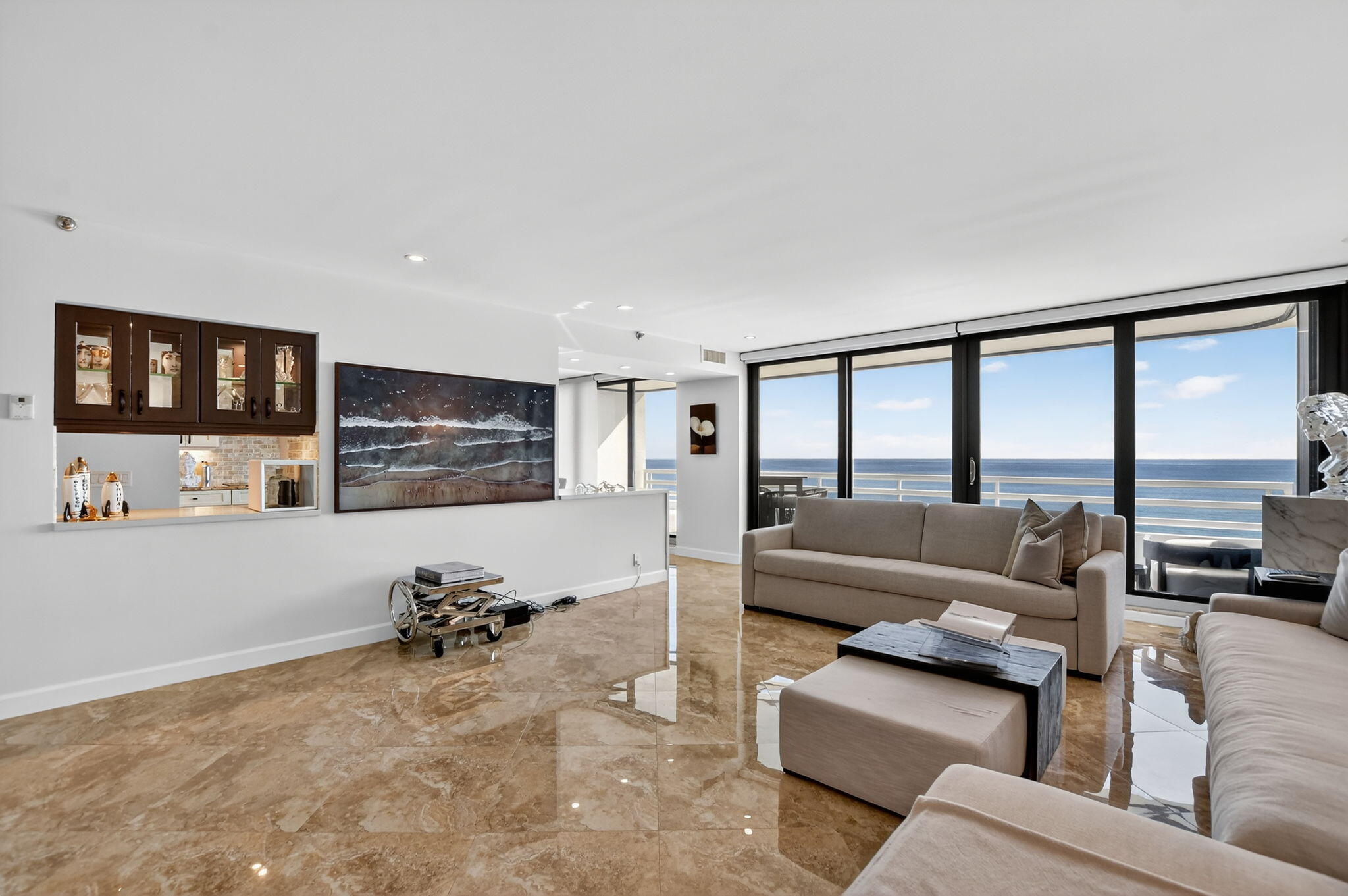 1500 South Ocean Boulevard, Unit 704 Boca Raton, FL 33432 - Photo 5 of 78 a living room with furniture and a flat screen tv