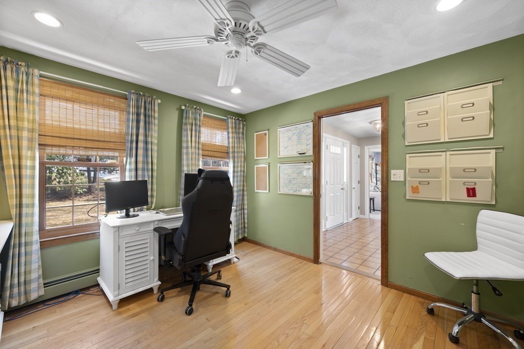 8 Penbrook Circle Andover, MA 01810 - Photo 12 of 42 a view of a workspace with furniture and a window
