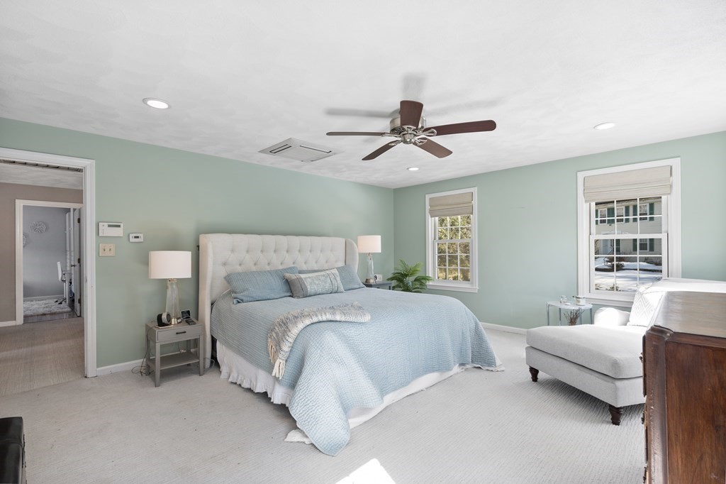 8 Penbrook Circle Andover, MA 01810 - Photo 19 of 42 a bedroom with a bed and a large window