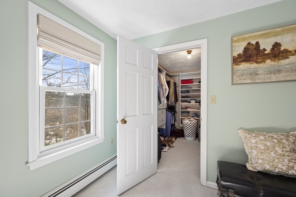 8 Penbrook Circle Andover, MA 01810 - Photo 21 of 42 a living room with furniture and a window
