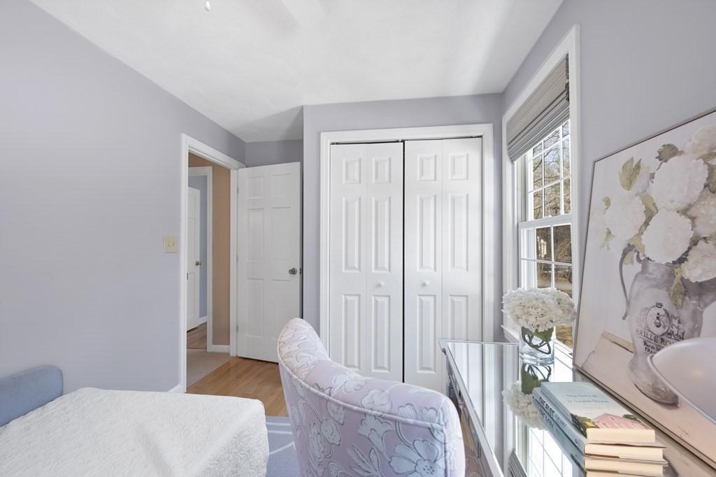 8 Penbrook Circle Andover, MA 01810 - Photo 25 of 42 a living room with furniture and a large window