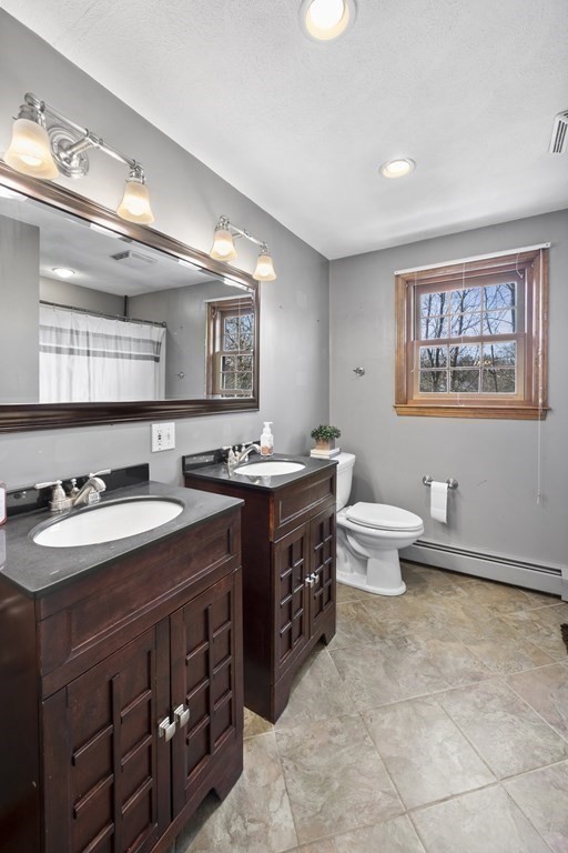 8 Penbrook Circle Andover, MA 01810 - Photo 30 of 42 a kitchen with a sink stove and cabinets