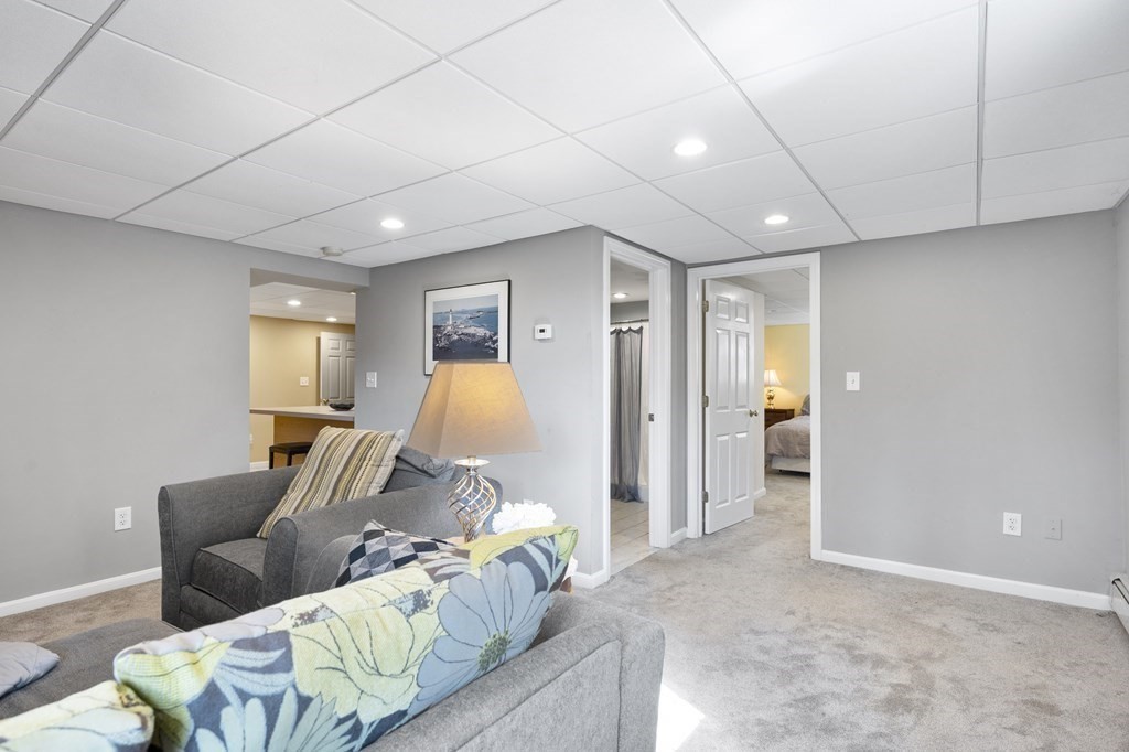 8 Penbrook Circle Andover, MA 01810 - Photo 33 of 42 a bed room with furniture and a window