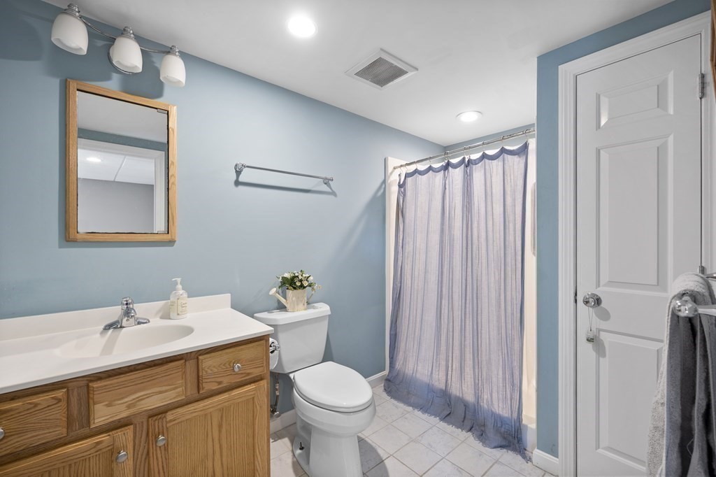 8 Penbrook Circle Andover, MA 01810 - Photo 36 of 42 a bathroom with a sink toilet and shower