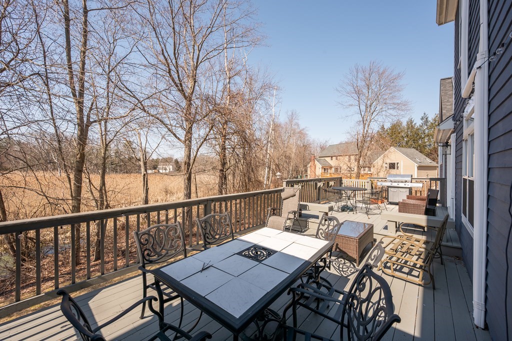 8 Penbrook Circle Andover, MA 01810 - Photo 40 of 42 a view of a patio on wooden deck and patio
