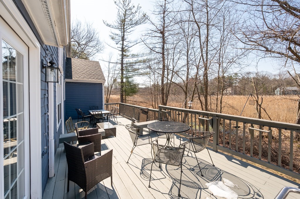 8 Penbrook Circle Andover, MA 01810 - Photo 41 of 42 a view of a balcony with chairs