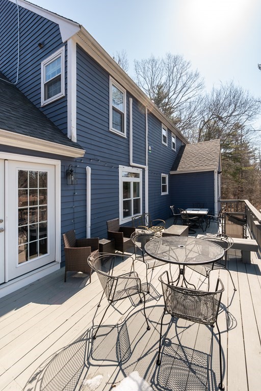 8 Penbrook Circle Andover, MA 01810 - Photo 42 of 42 a view of a patio with furniture and a fire pit