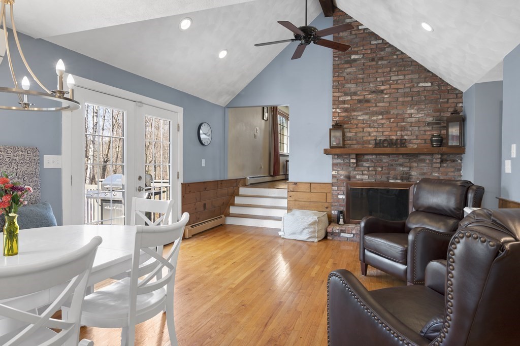 8 Penbrook Circle Andover, MA 01810 - Photo 6 of 42 a living room with furniture and a fireplace
