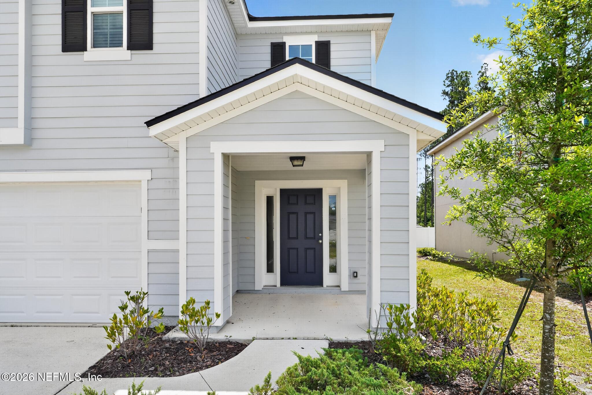 4818 Morning Rise Circle Jacksonville, FL 32218 - Photo 2 of 33 02_4818_Morning_Rise_Cir-Exterior-8462