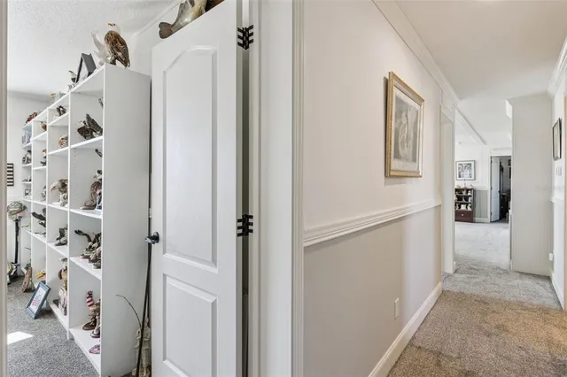 a room with furniture a window and wooden floor